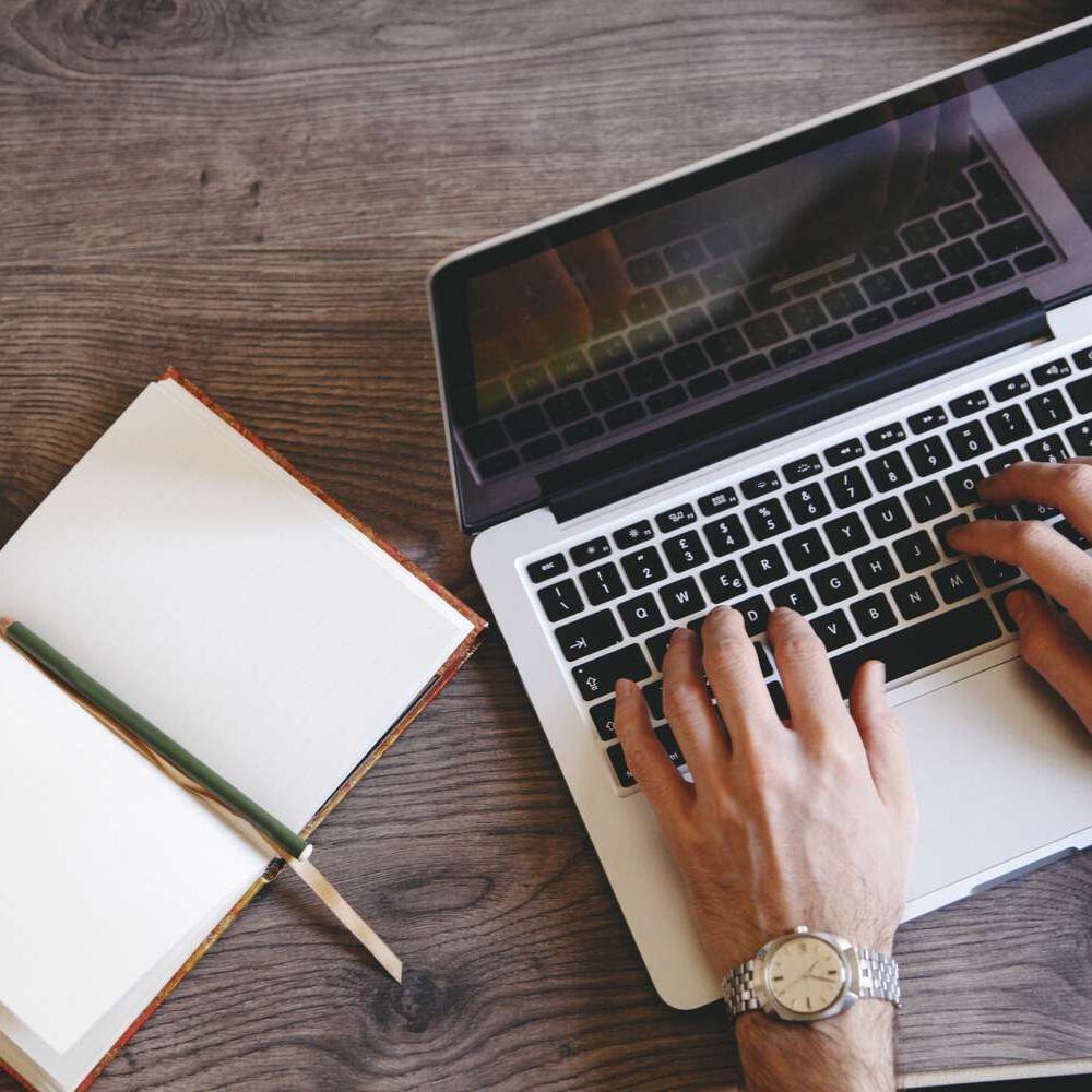 writing-on-a-laptop-468420712-5b1d350104d1cf003ce9029b